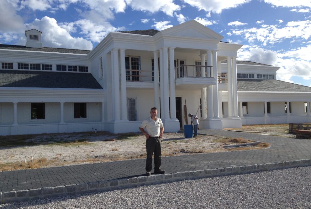 Jason in front of the horse barn in West Palm