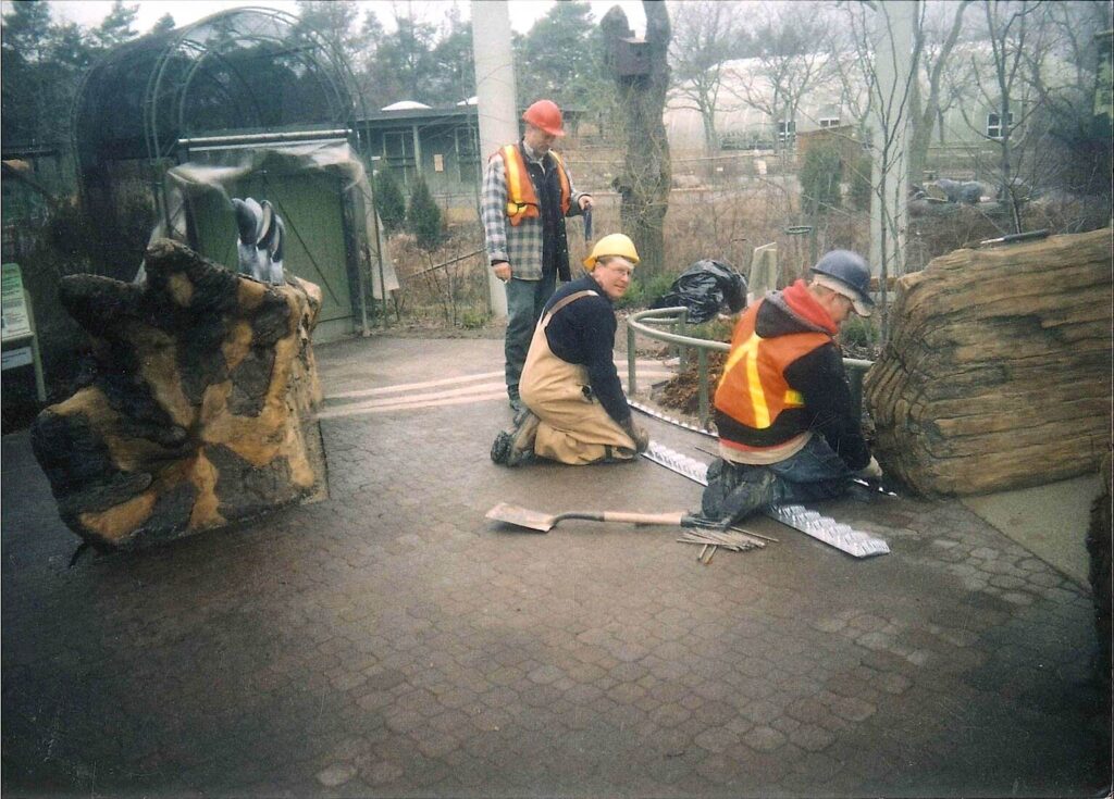 Toronto Zoo Installation of the 4 way recycled rubber pieces