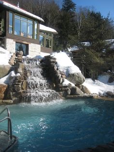 Waterfall into a pool in winter time